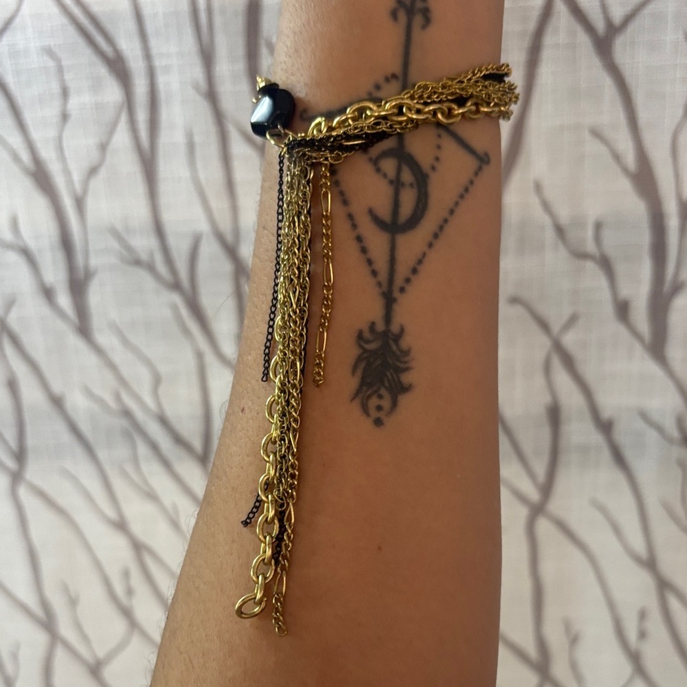 Elegant Gold and Black Tassel Bracelet